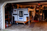Four Wheel camper on dolly in garage