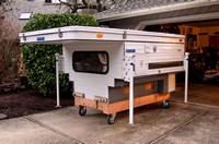 Front corner view of Four Wheel camper on dolly
