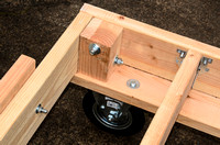 Non-steerable wheel on front end of dolly