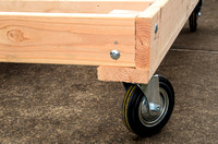 Steerable wheel on back end of dolly